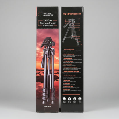 Two National Geographic camera tripod packaging boxes on a wooden surface.