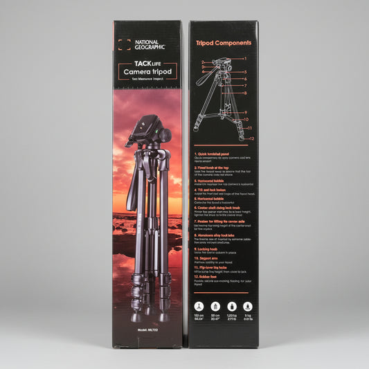 Two National Geographic camera tripod packaging boxes on a wooden surface.