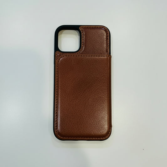 Brown phone case with 'Cose' branding in a clear package on a white background
